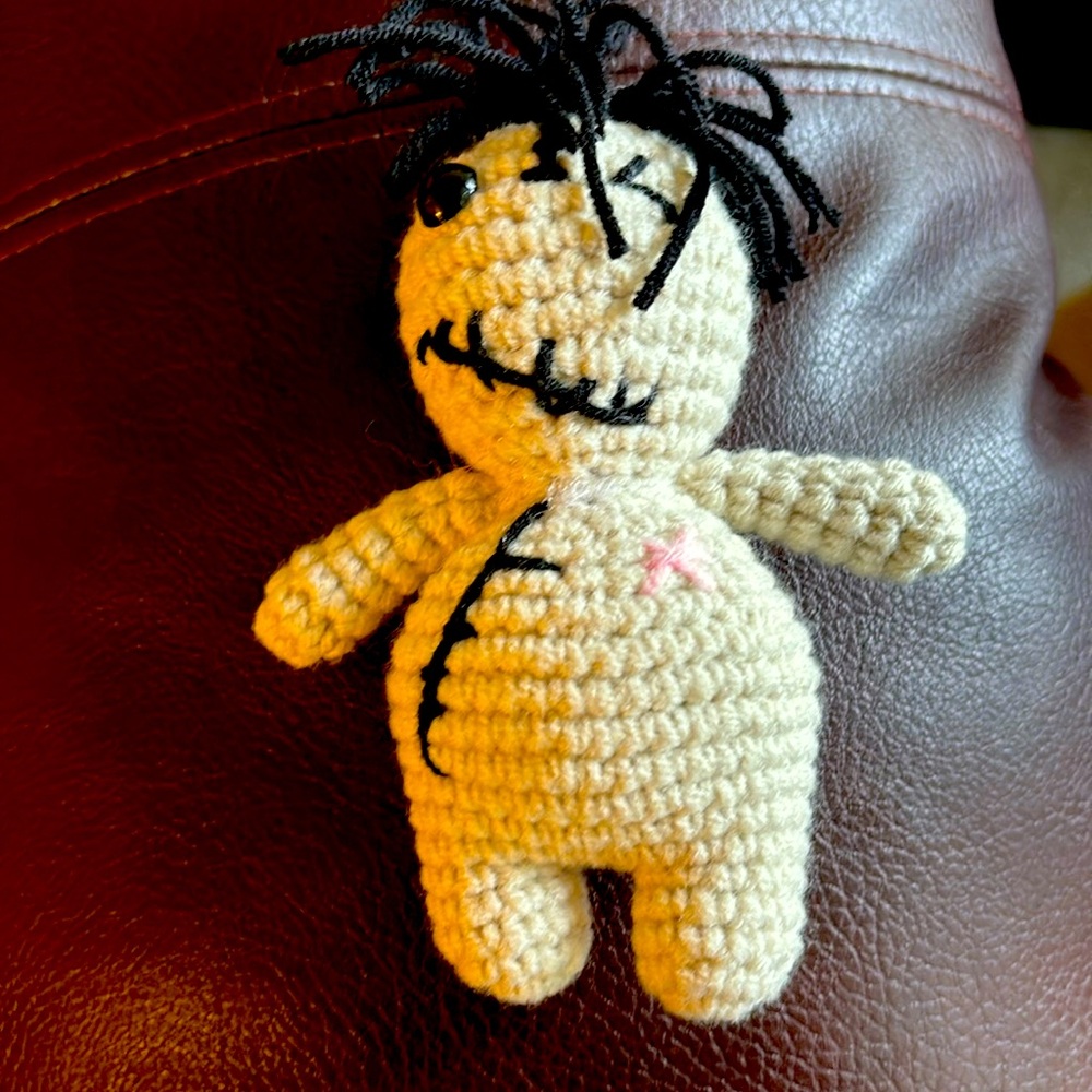 Small voodoo doll.